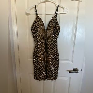 gold sequined and black mini dress